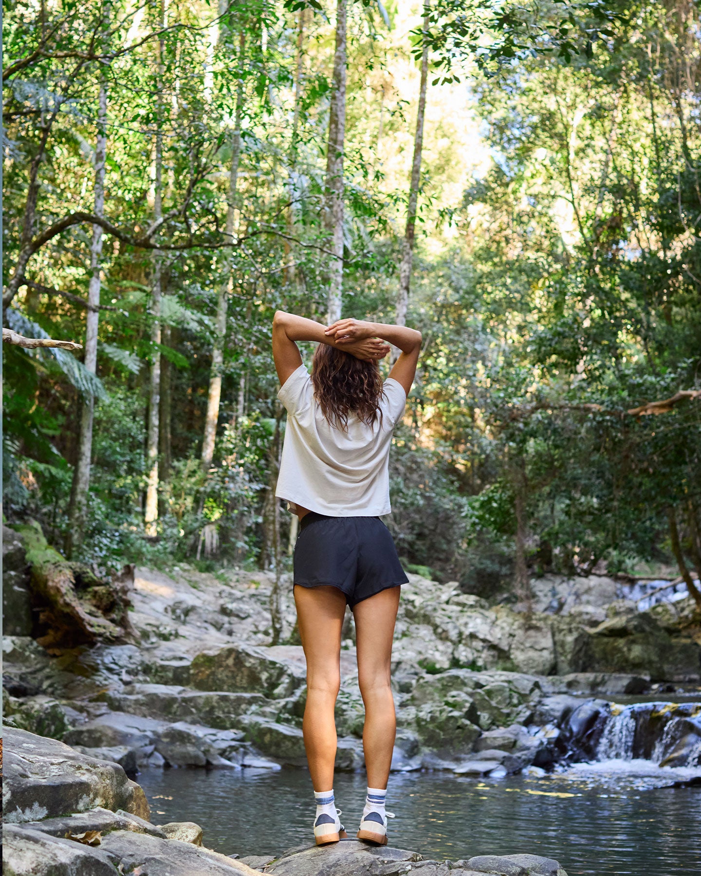Follow Odessa Board Shorts - Black — women's wakeboard boardshorts, lifestyle view 4