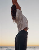 Follow Serena Jogger - Deep Charcoal — women's wakeboarding jogger, lifestyle view 3