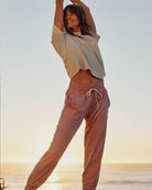 Follow Serena Jogger - Pastel Pink — women's wakeboarding jogger, lifestyle view 3
